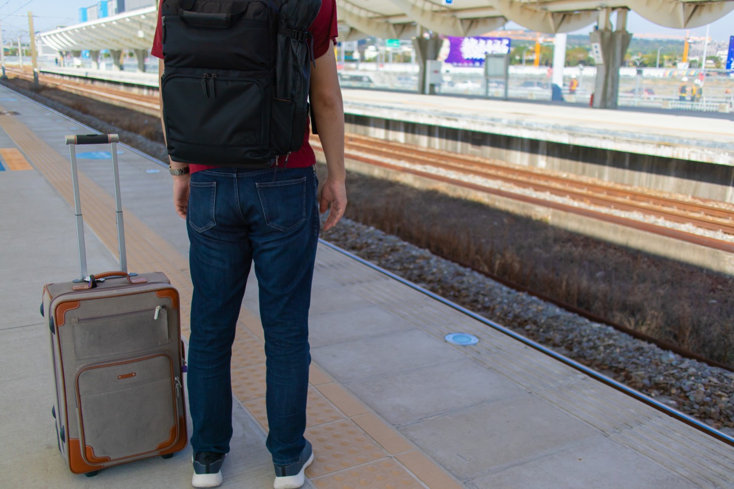 Travelers standing on the platform