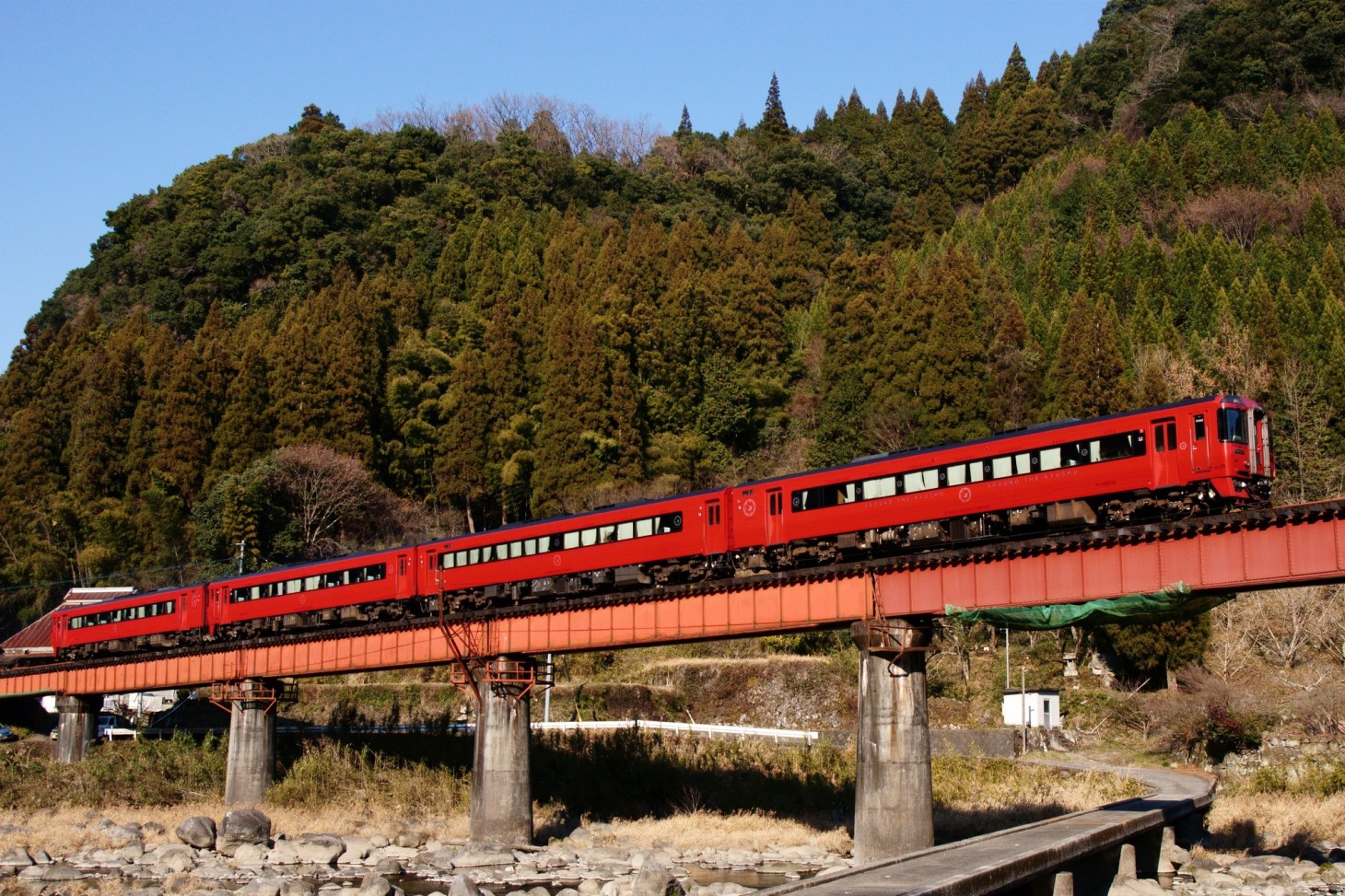 The "YUFU" Limited Express crosses a railway bridge.